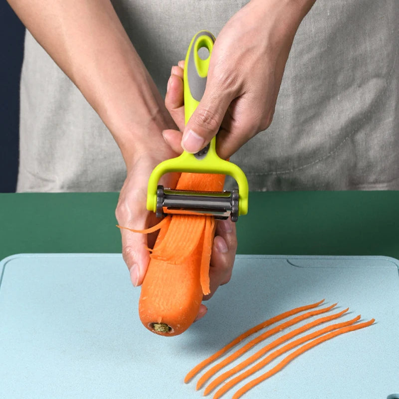 Descascador rotativo multifuncional 3 em 1 para cozinha em fundo branco