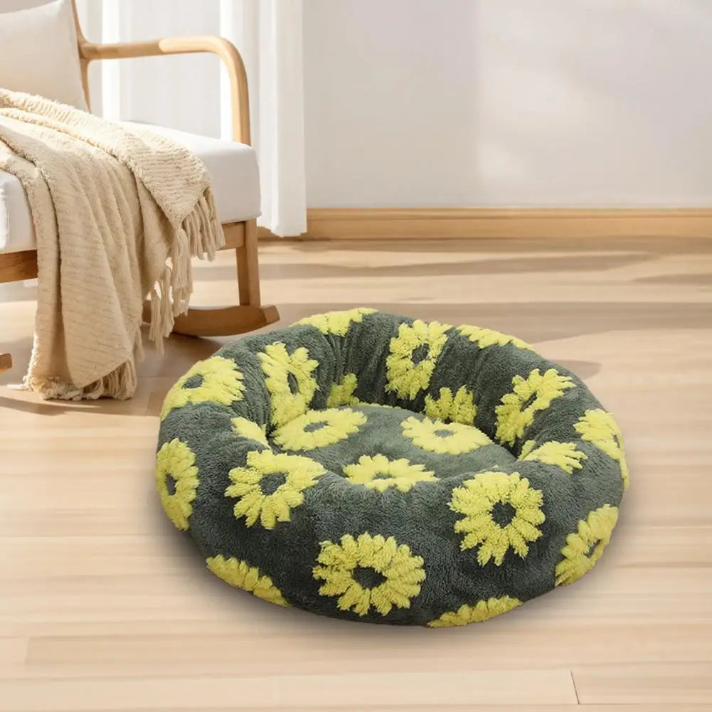 Cama calmante anti ansiedade para pet em pelúcia redonda formato donut em fundo branco