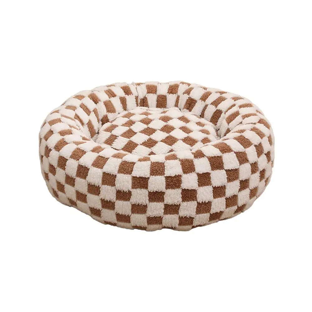 Cama calmante anti ansiedade para pet em pelúcia redonda formato donut em fundo branco