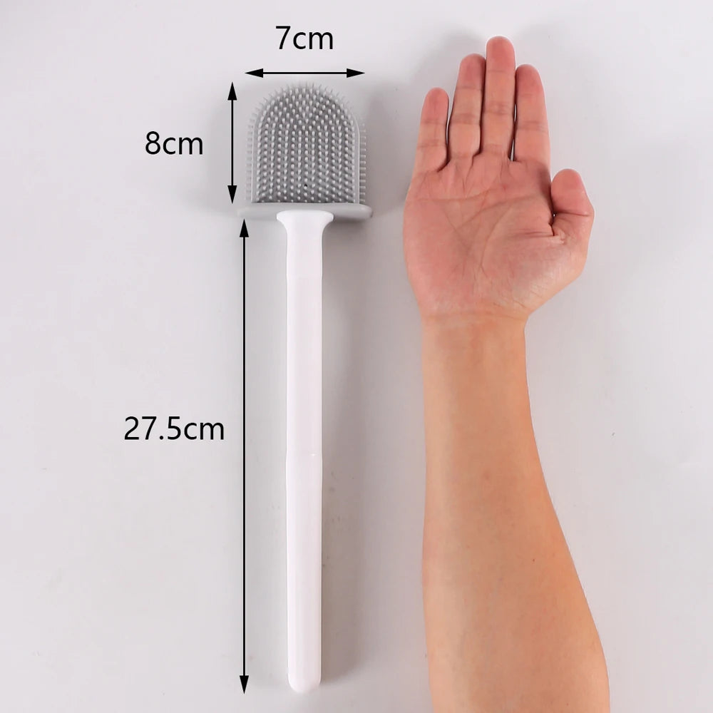 Escova de vaso sanitário em silicone com suporte de parede em fundo branco