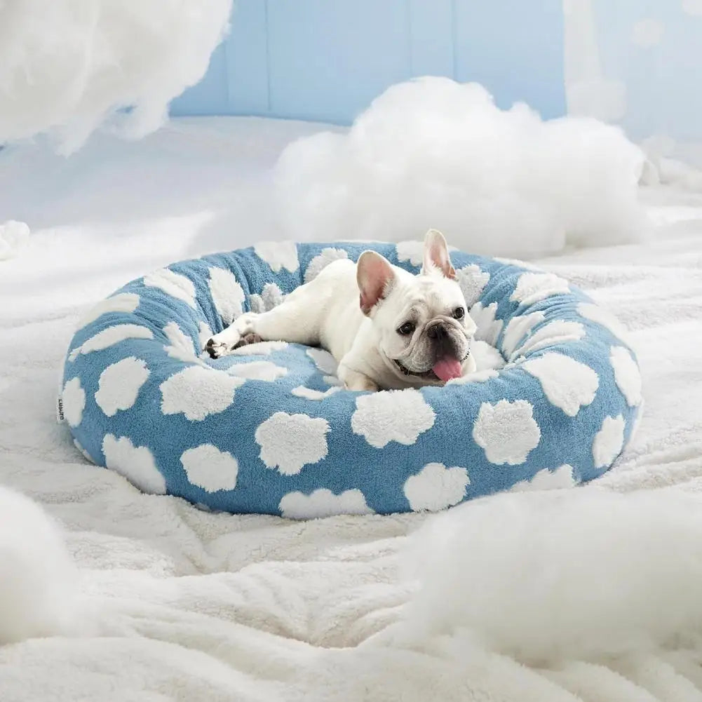 Cama calmante anti ansiedade para pet em pelúcia redonda formato donut em fundo branco