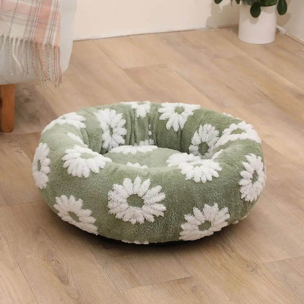 Cama calmante anti ansiedade para pet em pelúcia redonda formato donut em fundo branco