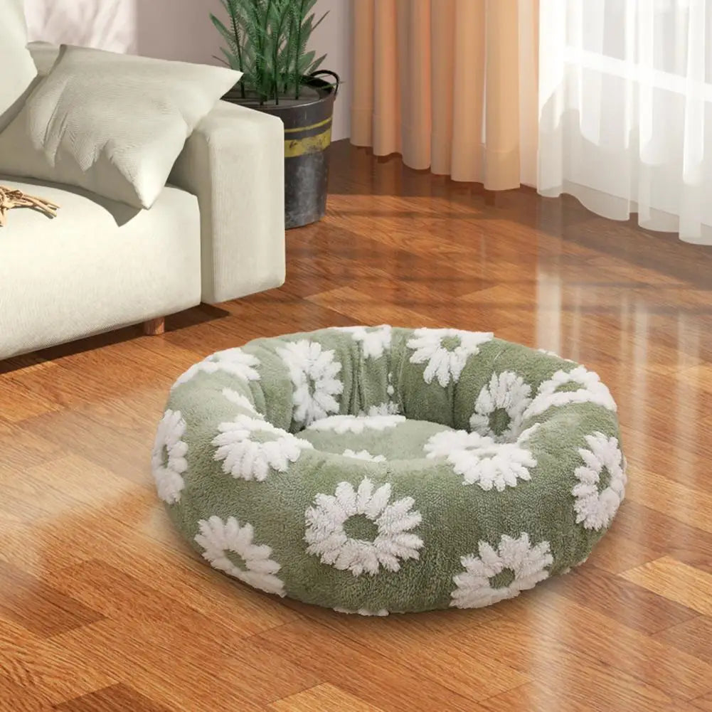 Cama calmante anti ansiedade para pet em pelúcia redonda formato donut em fundo branco