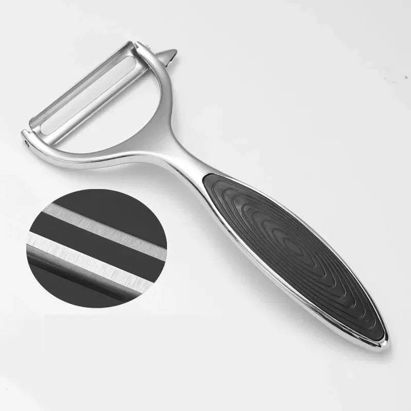 Descascador multifuncional de aço inox com ralador integrado em fundo branco