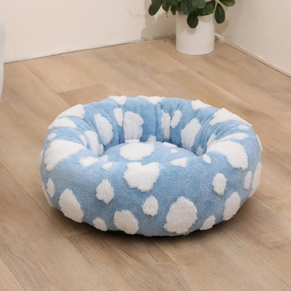 Cama calmante anti ansiedade para pet em pelúcia redonda formato donut em fundo branco