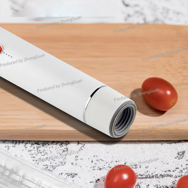 Seladora a vácuo portátil manual elétrica para alimentos em fundo branco