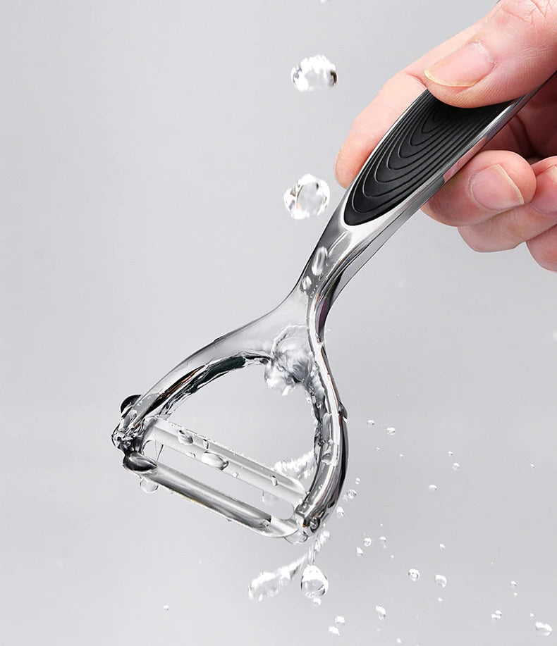 Descascador multifuncional de aço inox com ralador integrado em fundo branco